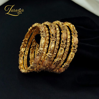 Gold style bangles set