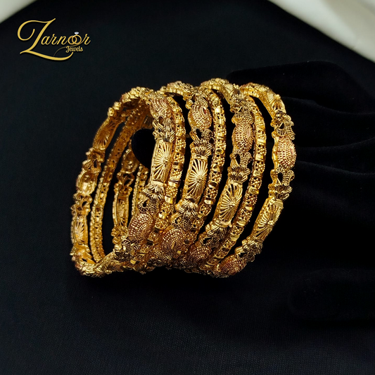 Gold style bangles set